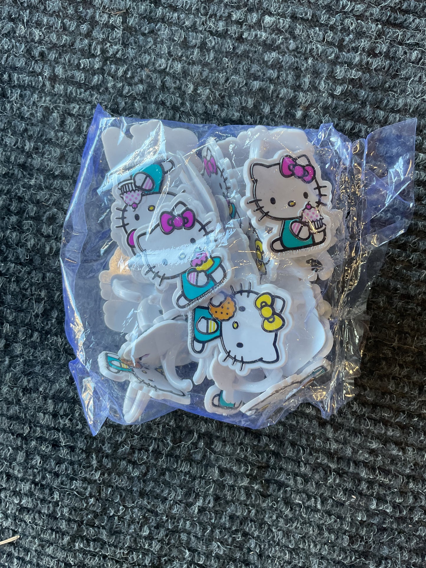 DecoPac Hello Kitty® Rings, Cupcake Decorations Featuring Hello Kitty and Mimmy, Pink And Yellow - 24 Pack