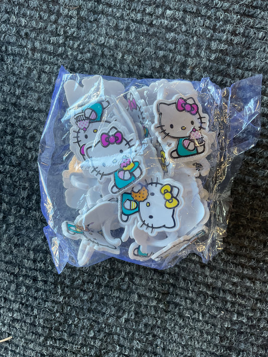 DecoPac Hello Kitty® Rings, Cupcake Decorations Featuring Hello Kitty and Mimmy, Pink And Yellow - 24 Pack